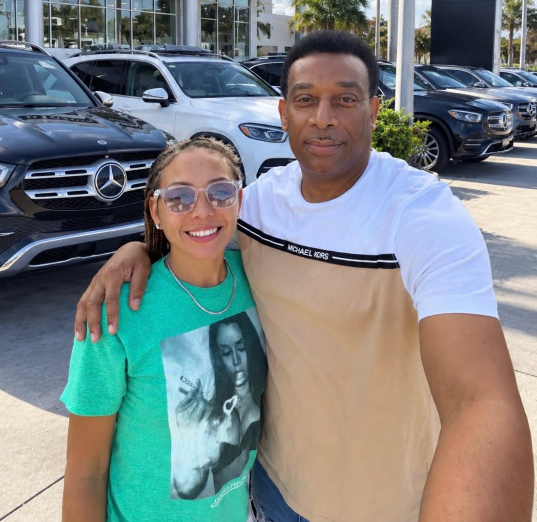 Martindale with a customer at a Mercedes-Benz dealership